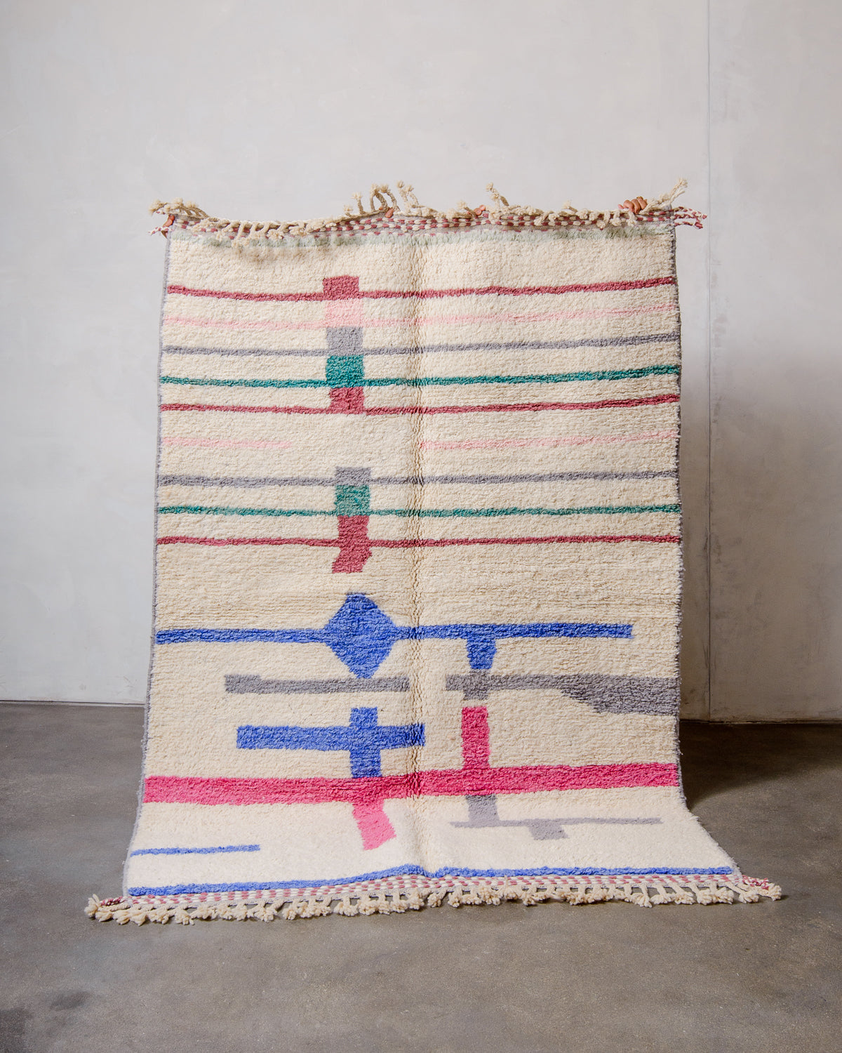 Modern, designer, handcrafted Berber rug from Morocco. Beniourain carpet with beautiful colours and patterns and fluffy wool texture.